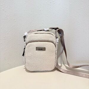 DKNY Gigi Puddle Faux Shearling Cream Flight Crossbody Bag OS NWT